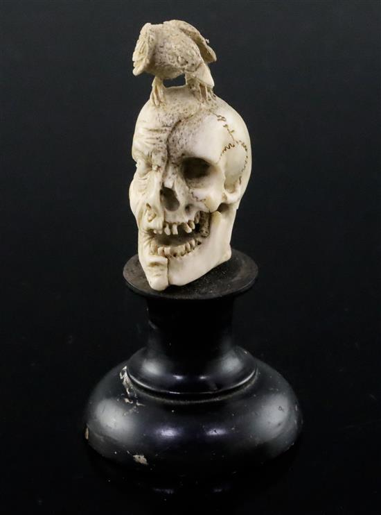 A 19th century Dieppe carved bone memento mori, overall height 10cm